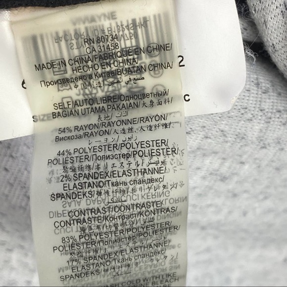 BCBGMAXAZRIA | Viviayne Blue Zip Front Peplum Top - Picture 12 of 16